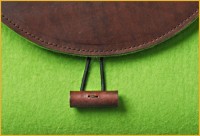 umhängetasche grün leder